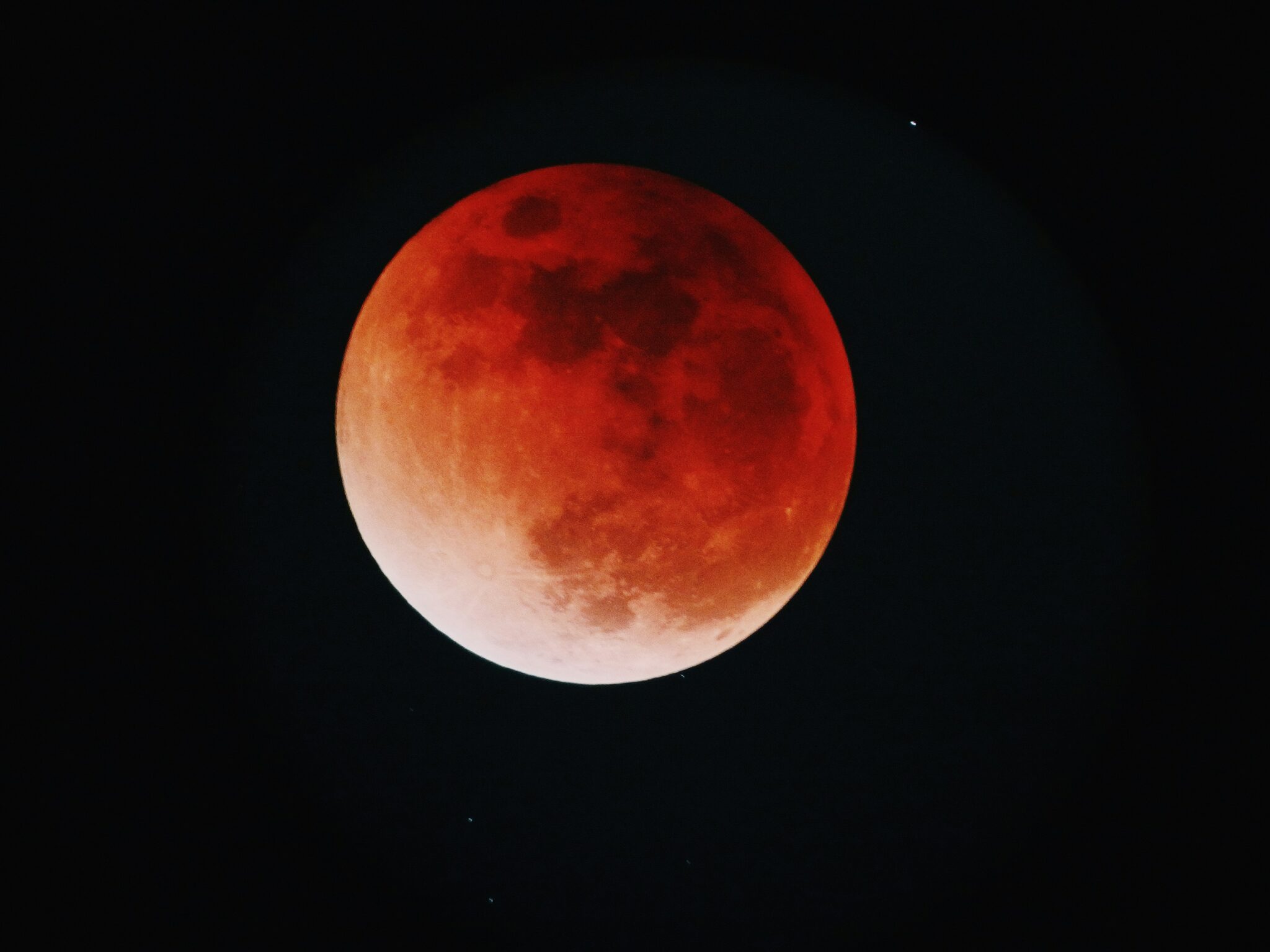 Lunar eclipse. Photo by Yu Kato on Unsplash